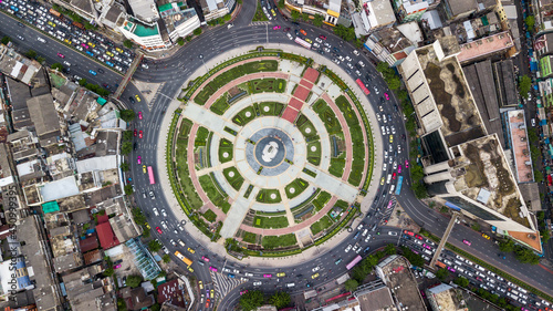 Aerial top view road roundabout with car lots in Bangkok City, Thailand, Circle Road traffic transport junction traffic road with vehicle movement