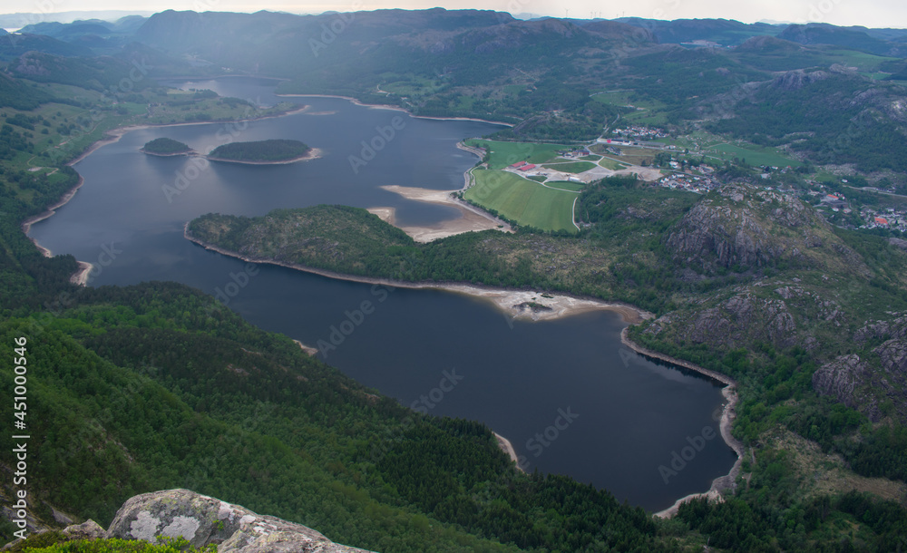 Dramatic areial view of lake town from top of Fjords in Southern Norway - European Hiking and travel Concept