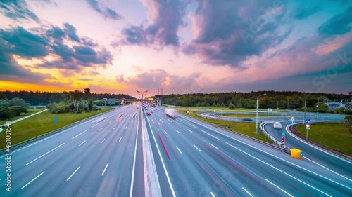 Timelapse of Cars at a big Road Autobahn Runway it nightfall late Evening Sunset Blue Hour Car