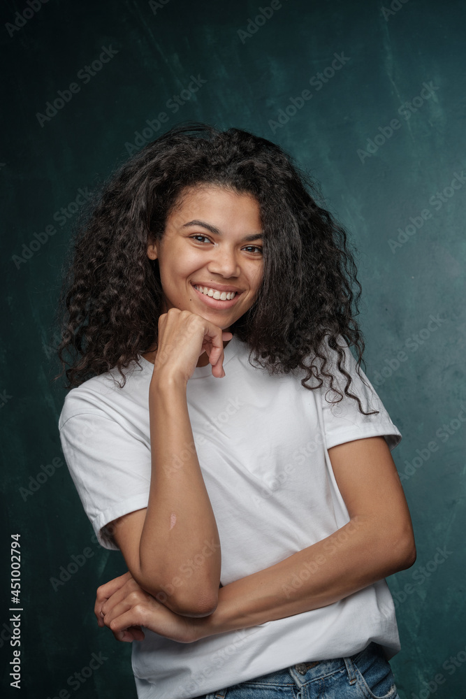 Photo portrait of gorgeous afro american curly girl smiling Photo portrait of gorgeous afro american curly girl smiling