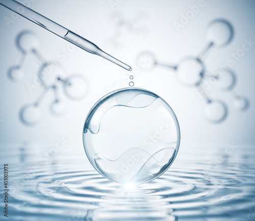 Cosmetic pipette with Cosmetic Essence, Liquid drop on a white background photo