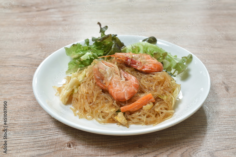 fried glass noodles with shrimp and cabbage with egg on plate fried glass noodles with shrimp and cabbage with egg on plate