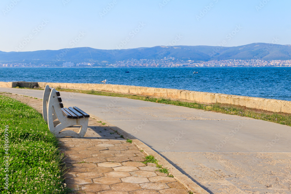 Bench on the embankment of the sea