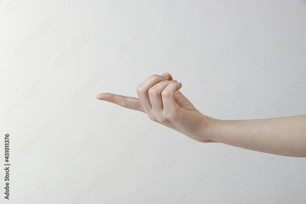 Close-Up Of Cropped Hand Pointing Finger Close-Up Of Cropped Hand Pointing Finger