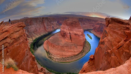 An evening sunset shot of Horseshoe Bend -- a horseshoe shaped canyon high above the Colorado River near Lake Powell and the Grand Canyon.