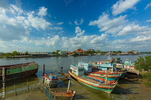 beautiful sky fishing boat,fishing boats under a sunset in a fishing harbor