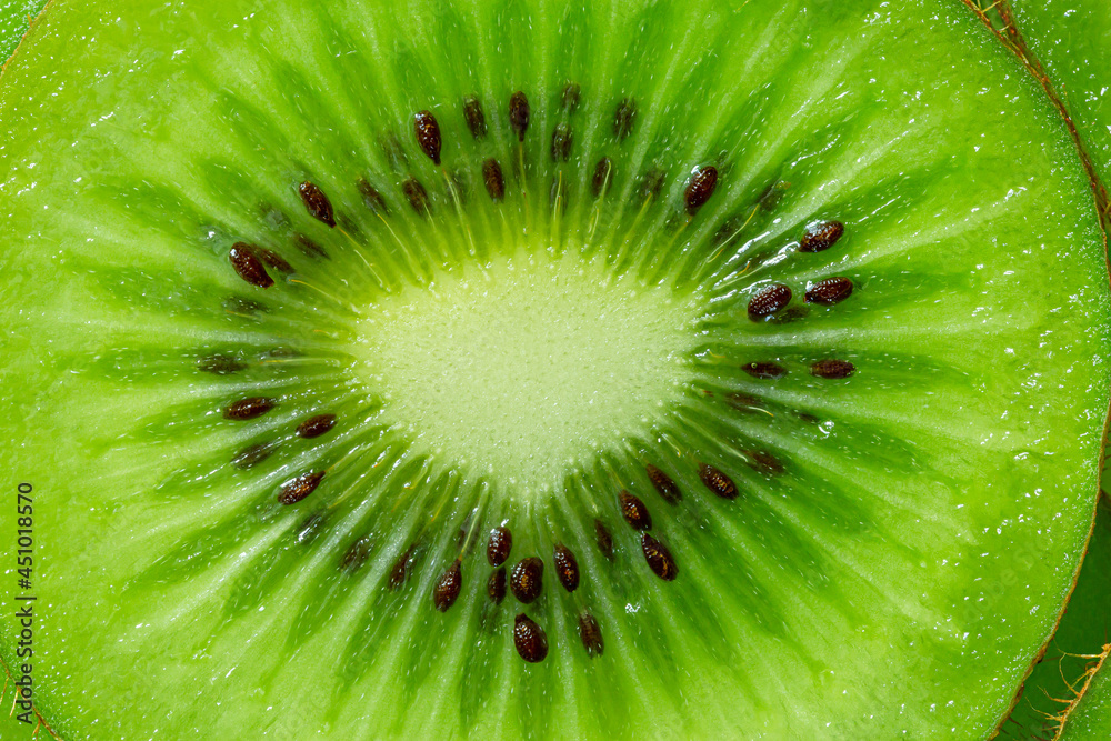 Kiwi Macro,slice of kiwi fruit on a full frame. horizont Kiwi Macro,slice of kiwi fruit on a full frame. horizont