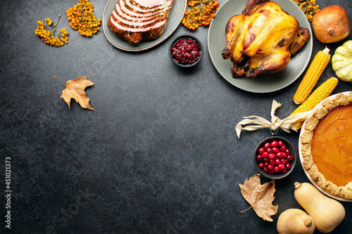 Thanksgiving traditional food for festive charity or family and friends dinner party, top-down view