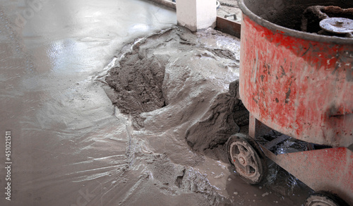 cement flooring process with spinning matchine photo