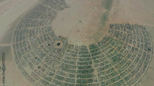 Aerial view of Black Rock City often abbreviated to BRC is the name of the temporary town created by Burning Man participants located since 1991 at in northwestern Nevada 4k high resolution animation photo