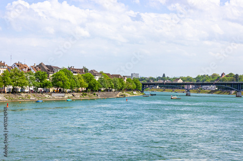 Panoramic view over turquoise Rhine river on a summer day in the centre of Basel, Switzerland