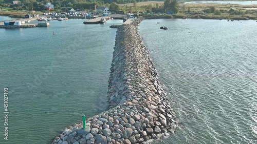 Flying toward small seaport 