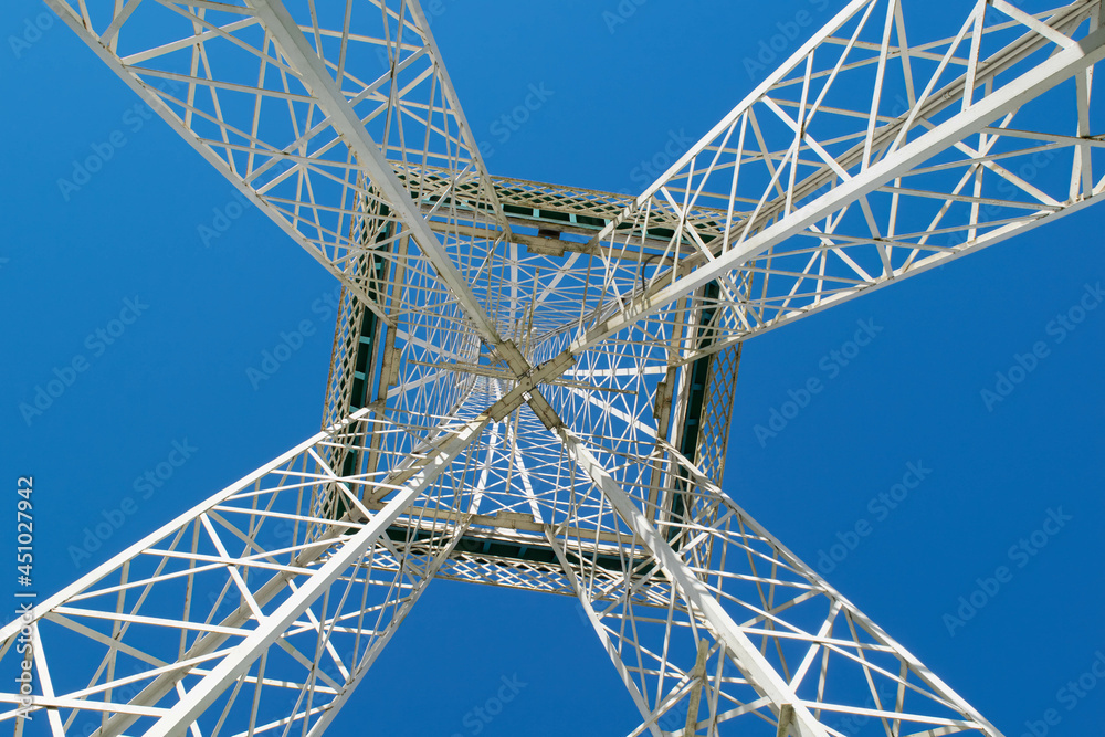 voltage tower against blue sky
