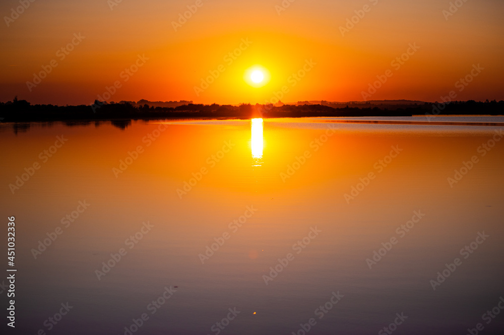 Beautiful tranquil sunset on the lake