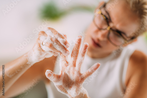 Obsessive compulsive disorder concept. Woman Obsessively Washing her Hands. photo
