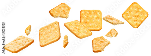 Falling crackers isolated on white background photo