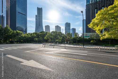 road with modern office building in hangzhou china