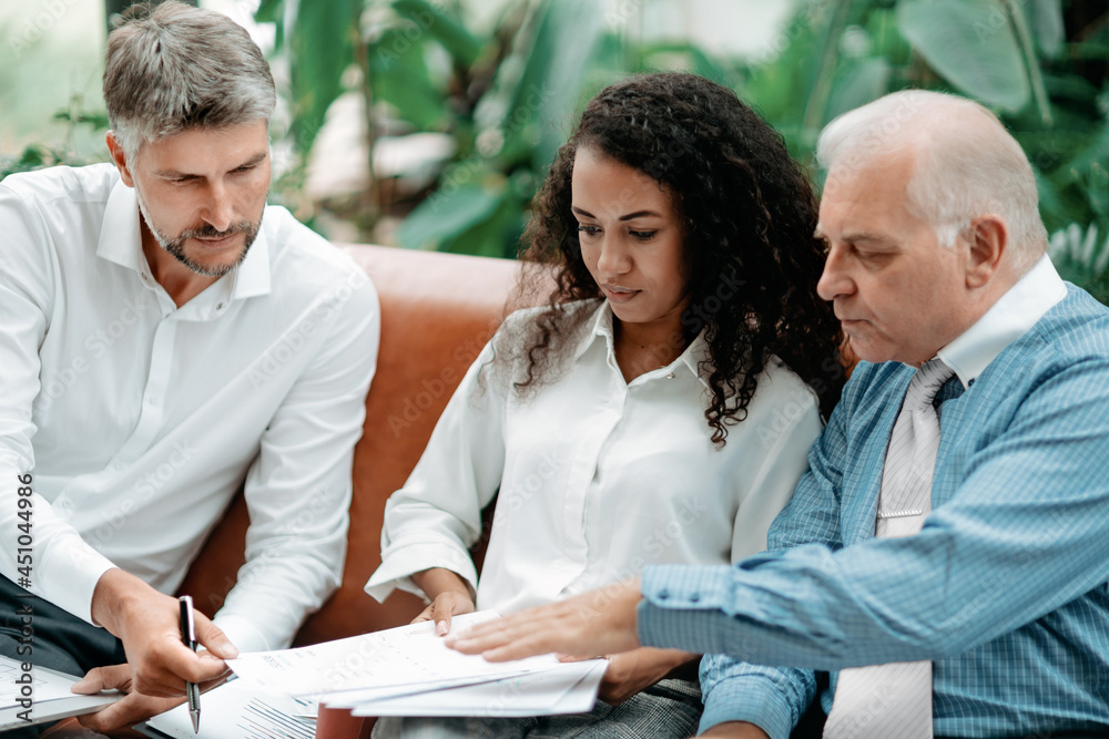 group of business people discussing a profitable business offer group of business people discussing a profitable business offer