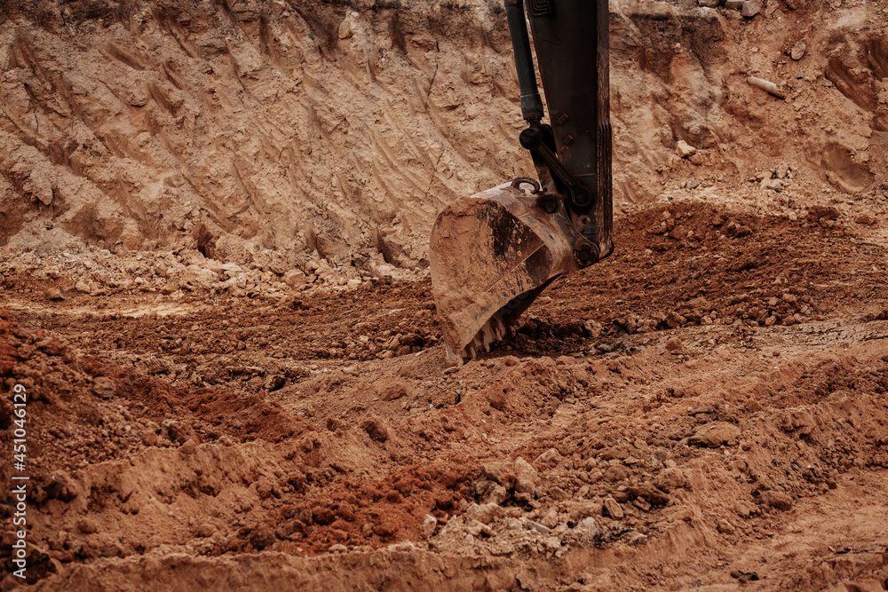Fototapeta premium Backhoe working construction site.