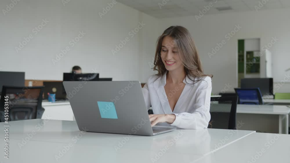 Happy girl finished her online work on laptop Happy girl finished her online work on laptop