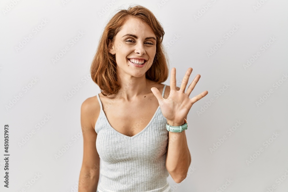 Beautiful caucasian woman standing over isolated background showing and pointing up with fingers number five while smiling confident and happy. Beautiful caucasian woman standing over isolated background showing and pointing up with fingers number five while smiling confident and happy.