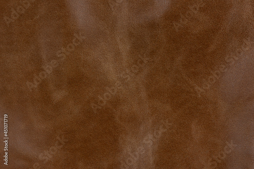 Bronze textured smooth leather surface background, small grain