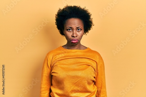 Young african american woman wearing casual clothes depressed and worry for distress, crying angry and afraid. sad expression. © Krakenimages.com