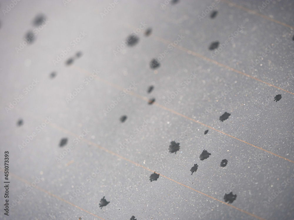 First water drops on car window shield when rain beggins First water drops on car window shield when rain beggins