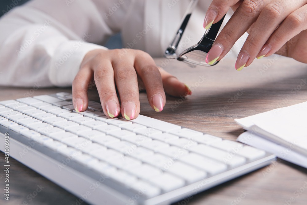 Fototapeta premium woman writes on the keyboard
