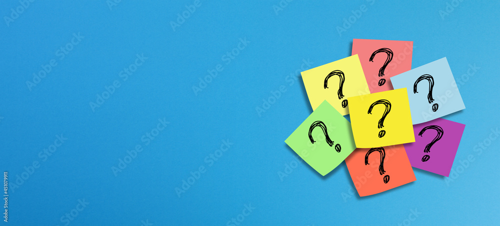 Note papers with question mark on panoramic blue background Note papers with question mark on panoramic blue background