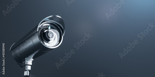 Wide close up image of cctv camera on gray background with mock up place for your text and advertisement. Control system concept. 3D Rendering.