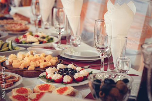 Festive table setting consisting of a variety of delicious dishes © leanna