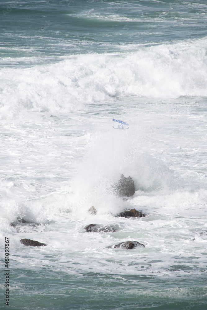 wave breaking on the beach