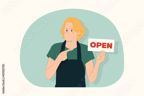 Young bartender woman pointing index finger on sign with OPEN title concept