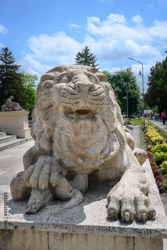 15-JUNE-2021 - ESSENTUKI, RUSSIA: Lion sculpture near the famous Semashko mud baths of 19th century in Essentuki, Caucasus, Russia 15-JUNE-2021 - ESSENTUKI, RUSSIA: Lion sculpture near the famous Semashko mud baths of 19th century in Essentuki, Caucasus, Russia