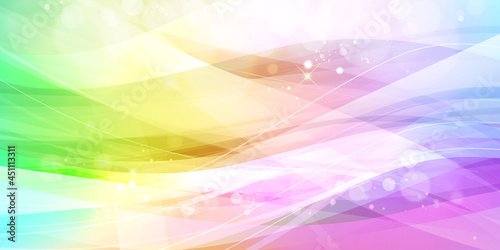 Fantastic glittery light abstract background in rainbow colors.