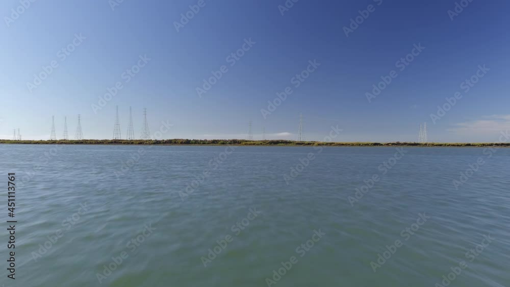 Low Aerial Over Water Approaching Power Lines Low Aerial Over Water Approaching Power Lines
