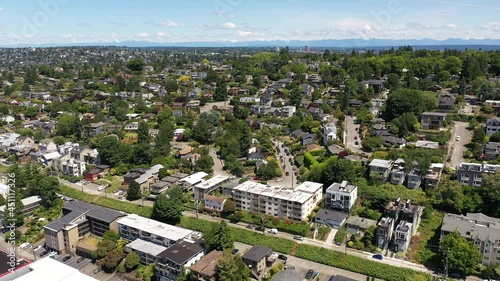 Cinematic 4K aerial drone dolly in shot of North Queen Anne, West Queen Anne, Fremont, Lake Washington Ship Canal,  coastal neighborhoods uptown by Puget Sound, in Seattle, Washington photo