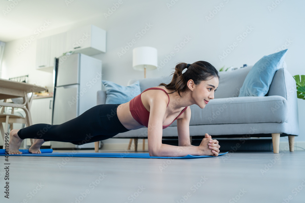 Asian Beautiful young woman stay home, doing cardio exercise at home. Asian Beautiful young woman stay home, doing cardio exercise at home.