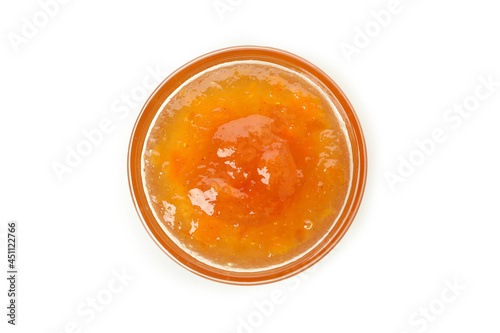 Bowl of peach jam isolated on white background