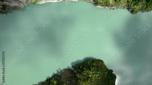 Turquoise water of narrow mountain lake Gigerwaldsee in the Canton of St. Gallen, Switzerland. photo