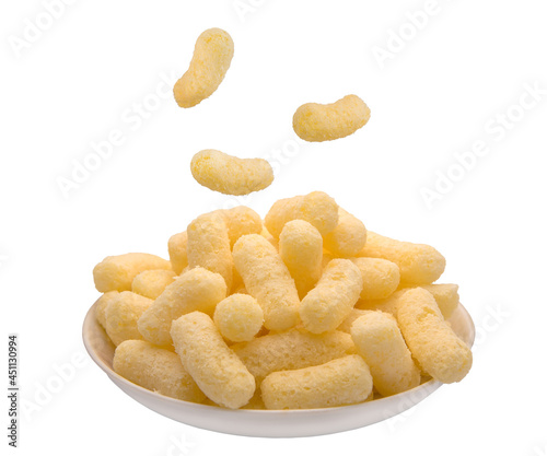 Corn puffs, finger food on a plate.