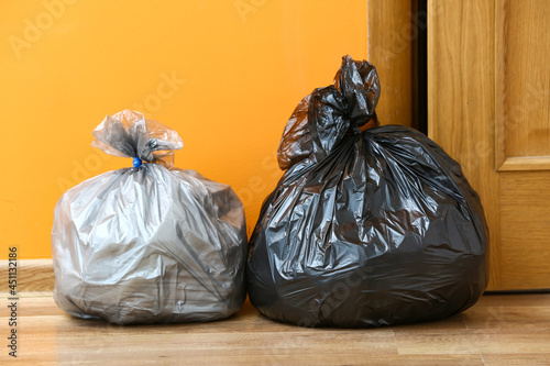 Bags with garbage near door