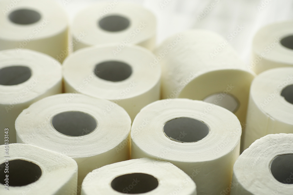 Toilet paper in a roll. Snow-white soft three-layer toilet paper. Lack of hygiene products. Primary protection and disinfection. Toilet paper in a roll. Snow-white soft three-layer toilet paper. Lack of hygiene products. Primary protection and disinfection.