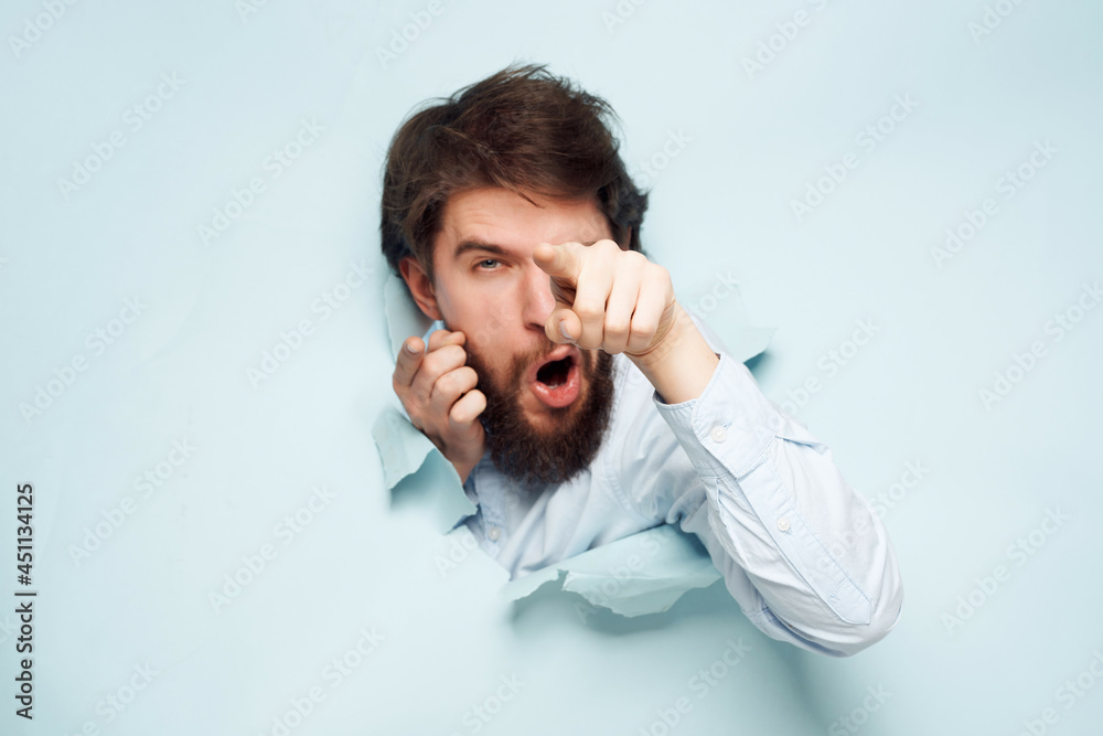 man in blue shirt peeking out of the background Job business man in blue shirt peeking out of the background Job business