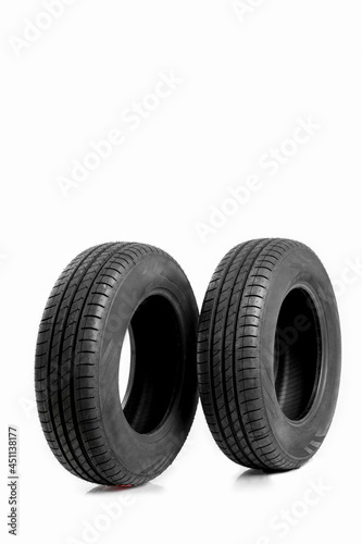 New car tire on white background. © PRASANNAPIX