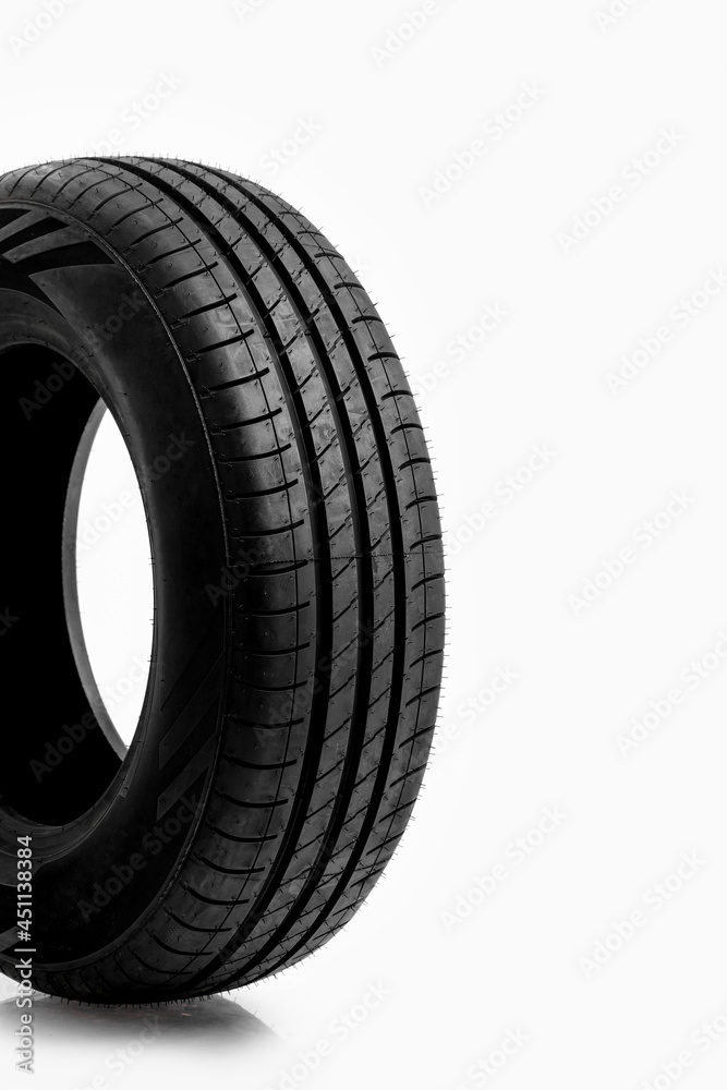 New car tire on white background.
