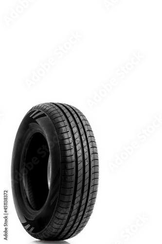 New car tire on white background. © PRASANNAPIX