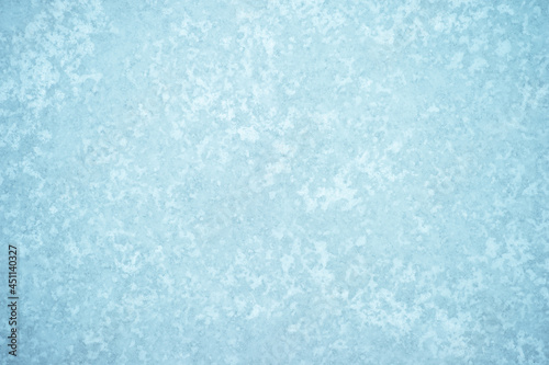 White and blue ice pattern with a minimal turquoise shade of ice in the frost. Light airy background