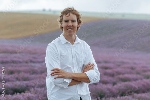 A man in a white shirt in a lavender field